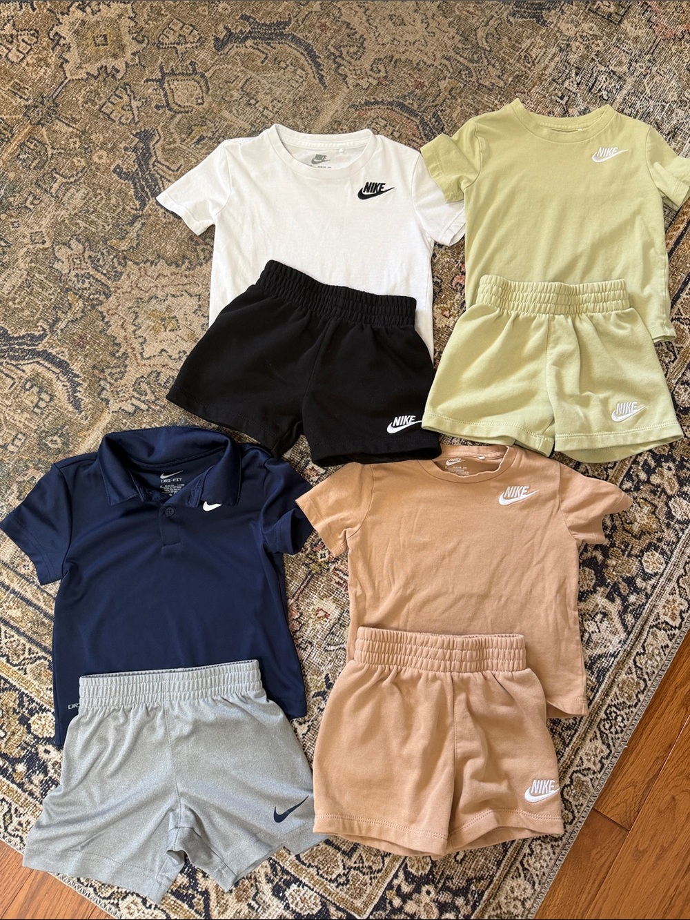 Four 2 pc Nike sets